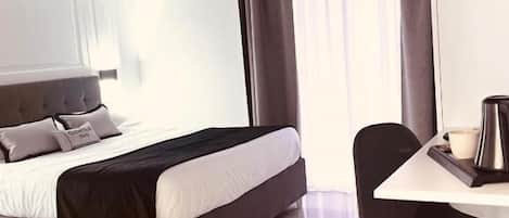 Family Studio Suite, Balcony, Courtyard View | In-room safe, soundproofing, free WiFi