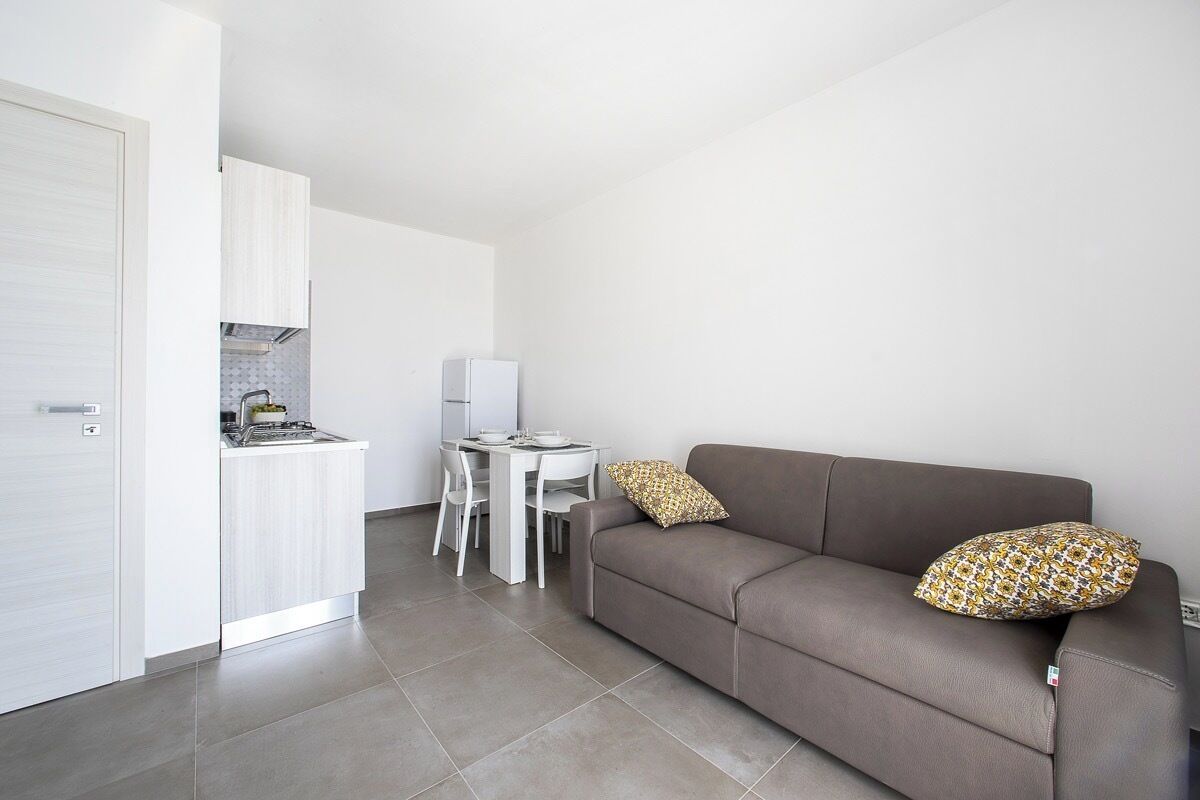 Appartement Deluxe, balcon, vue partielle sur la mer | Coin séjour