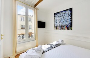 1 chambre, fer et planche à repasser, lit parapluie, Wi-Fi