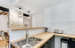 Fridge, microwave, oven, stovetop - An Exceptional 2-BR/2BA in Le Marais (Paris)
