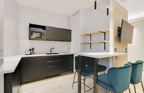 Fridge, microwave, oven, stovetop - A Dazzling Studio-Loft in Parc Monceau (Paris)