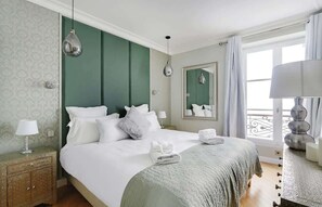 Iron/ironing board, travel crib, WiFi, bed sheets