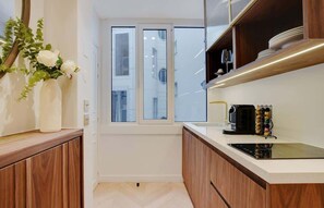 Fridge, microwave, coffee/tea maker, toaster