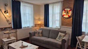 TV - Suite Porto-Cino Apartment with Wi-Fi and Air Conditioning (Gengenbach)