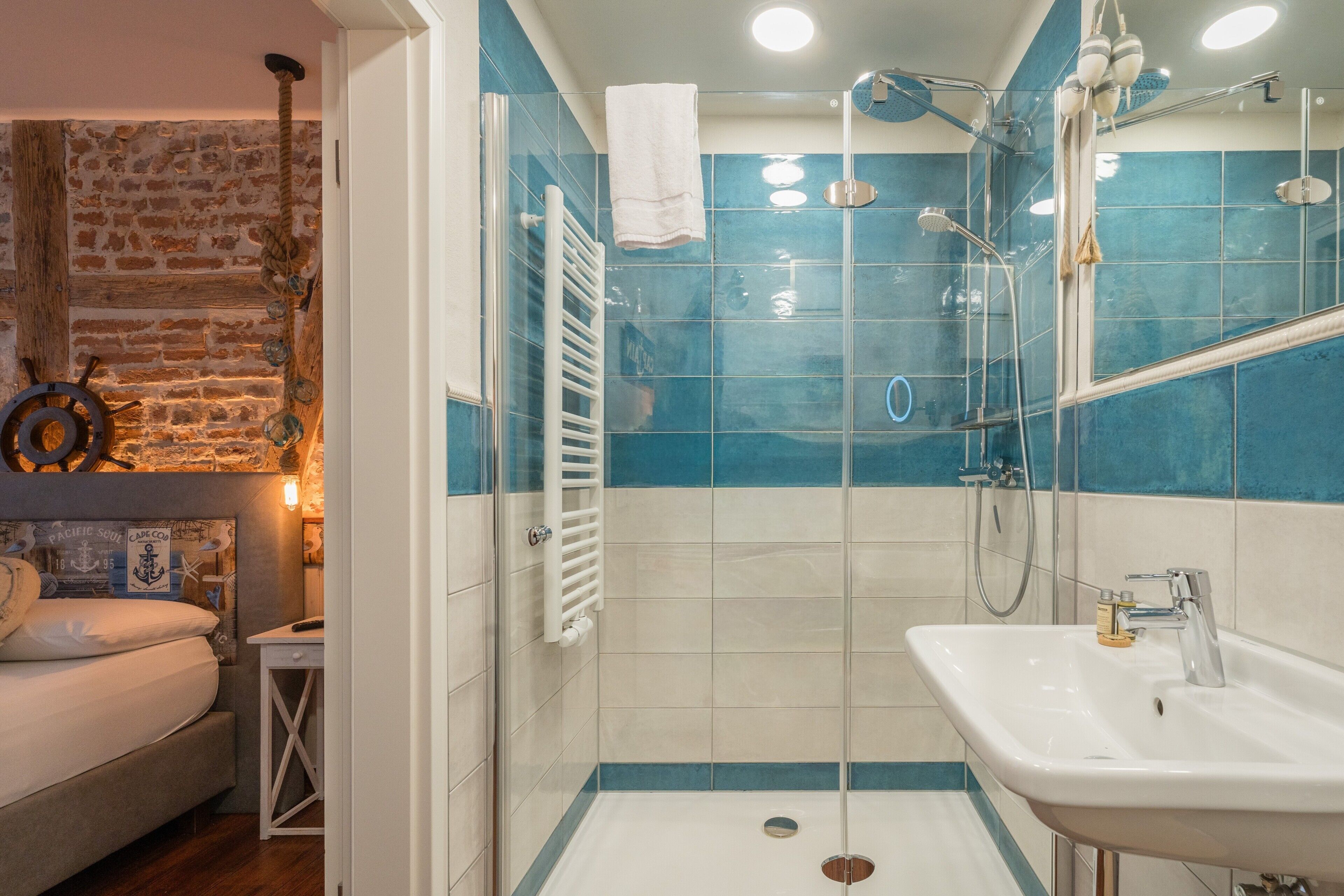 Shower, hair dryer, towels