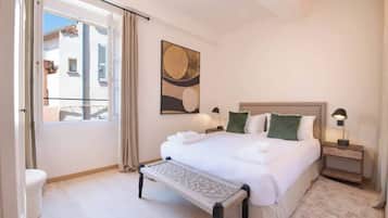 Iron/ironing board, travel crib, bed sheets