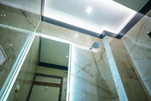 Shower, towels, soap, shampoo