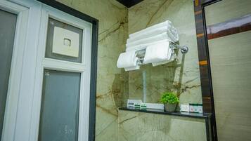 Shower, towels, soap, shampoo