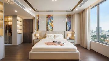 Premium bedding, down comforters, Select Comfort beds, free minibar