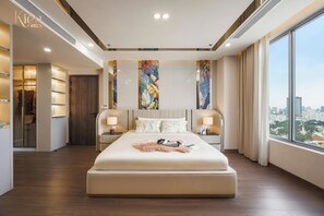 Premium bedding, down comforters, Select Comfort beds, free minibar