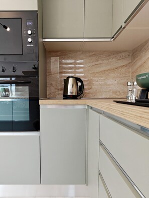 Fridge, microwave, oven, stovetop - Sky Haus 2 bedroom apartment (Fgura)