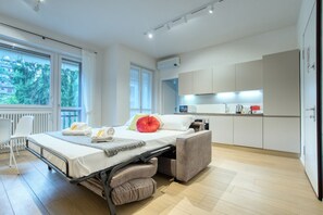 2 slaapkamers, een strijkplank/strijkijzer