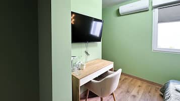 Standaard kamer | Een kluis op de kamer, verduisterende gordijnen