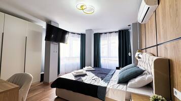 Luxe kamer | Een kluis op de kamer, verduisterende gordijnen