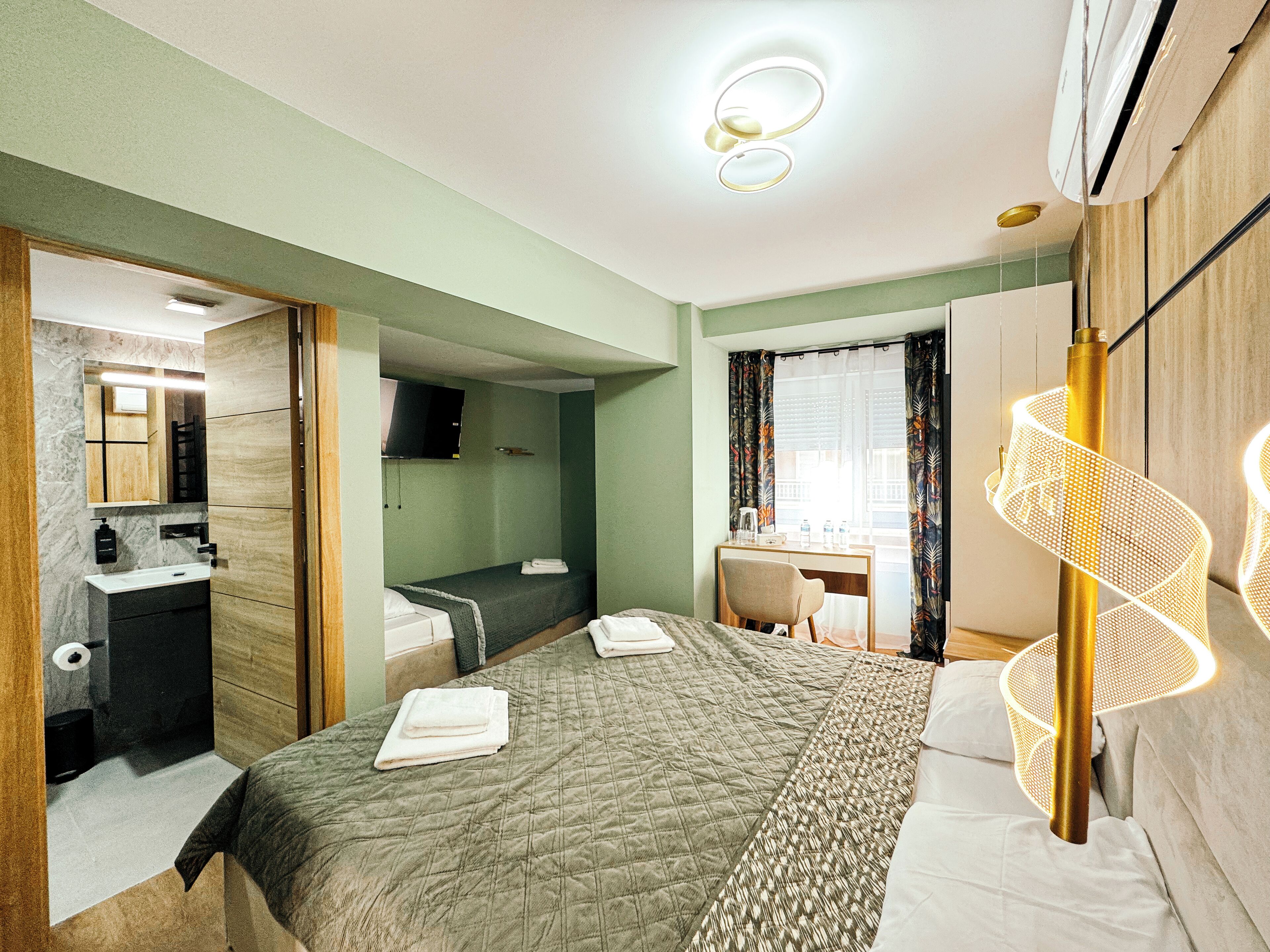 Standard Triple Room | In-room safe, blackout drapes, iron/ironing board, free WiFi