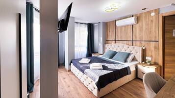 Luxe kamer | Een kluis op de kamer, verduisterende gordijnen