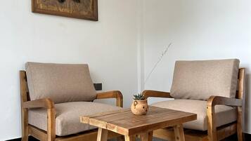 Appartement Standard | Coin séjour | Télévision à écran plat