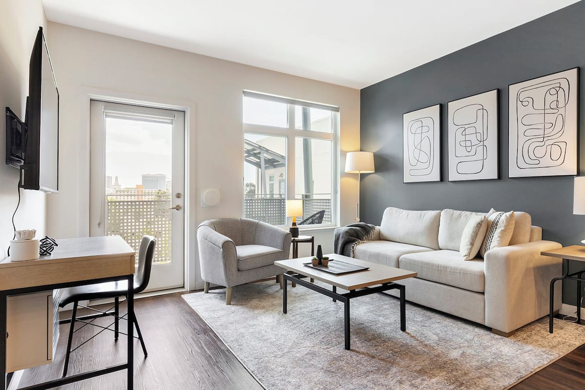 Apartment (2 Bedrooms) | Living area | 50-inch TV with digital channels