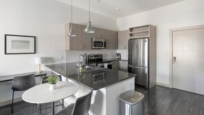 Fridge, dining tables - Landing | Stunning 1BD, Pool, Gym (Allen)