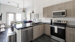 Fridge, dining tables - Landing | Stunning 1BD, Pool, Gym (Allen)