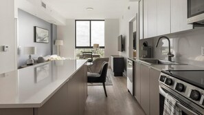 Fridge, dining tables - Landing | Stylish 2BD, Yoga Studio, Clubhouse (North Miami)