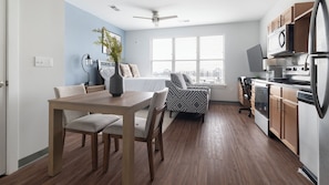 Studio (1 Bedroom) | Living area | 50-inch TV with digital channels, table tennis - Landing Apartments near Five Points South (Birmingham)