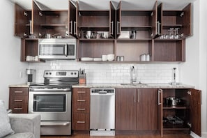 Fridge, dining tables - Landing | Stylish 2BD, Gym, Game Room (Kansas City)
