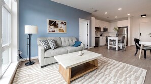 Apartment (1 Bedroom) | Living area | 50-inch TV with digital channels - Landing Furnished Apartments - Alexandria (Alexandria)