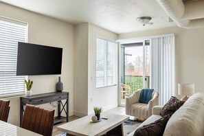 Apartment, 2 Bathrooms (2 Bedrooms) | Living area | 50-inch TV with digital channels - Landing Apartments Salt Lake City (Salt Lake City)