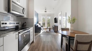 Fridge, dining tables - Landing | Modern 1BD, Gym, Pool (Austin)