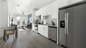 Fridge, dining tables - Landing | Modern 1BD, Pool, Gym (Austin)