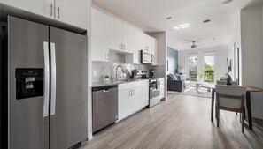 Fridge, dining tables - Landing | Modern 1BD, Gym, Pool (Austin)