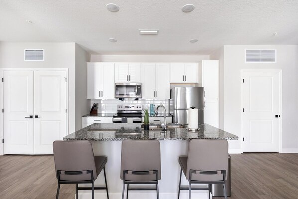 Fridge, dining tables - Landing | Stunning 2BD, Pool, Gym (Palm Bay)