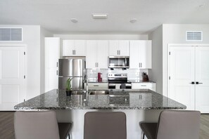 Fridge, dining tables - Landing | Stunning 2BD, Pool, Gym (Palm Bay)