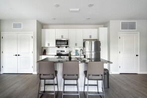 Fridge, dining tables - Landing | Spectacular 2BD, Gym, Pool (Palm Bay)