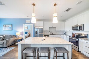 Fridge, dining tables - Landing | Modern 1BD, Pool, Yoga Studio (Vero Beach)
