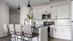Fridge, dining tables - Landing | Spectacular 2BD, Pool, Clubhouse (Buford)