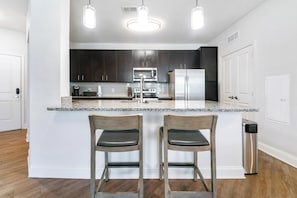 Fridge, dining tables - Landing | Stylish 2BD, Game Room (Daytona Beach)
