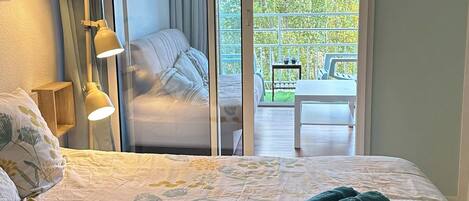 Fer et planche à repasser, draps fournis