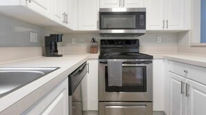 Fridge, dining tables - Landing | Chic 1BD, Tennis Court, Courtyard (North Port)