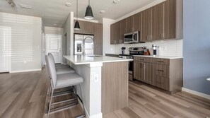 Fridge, dining tables - Landing | Incredible 1BD, Game Room, Pool (Longboat Key)
