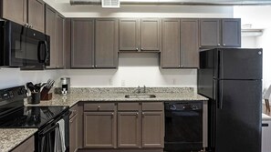 Fridge, dining tables - Landing | Chic 2BD, Rooftop Lounge, Courtyard (Richmond)