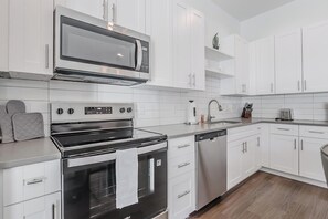 Fridge, dining tables - Landing | Spectacular 3BD, Gym (Four Corners)