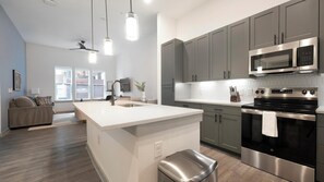 Fridge, dining tables - Landing | Modern 1BD, Gym, Pool (Austin)