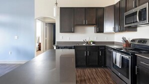 Fridge, dining tables - Landing | Stunning 1BD, Gym (The Woodlands)