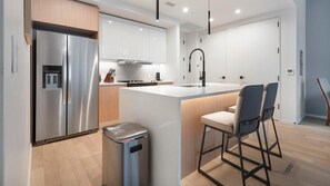 Fridge, dining tables - Landing | Chic 1BD, Gym, Yoga Studio (San Antonio)