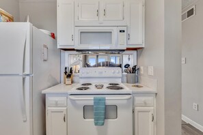 Fridge, microwave, oven, stovetop - Going Coastal in Beach Harbour - Ocean and Marina Views with a Community Pool! (Carolina Beach)