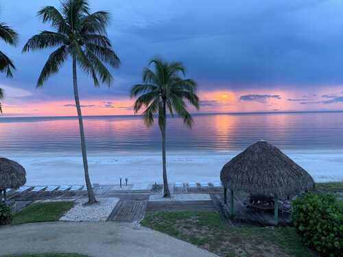 ON THE BEACH                       AT THE SOFT WHITE SAND