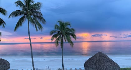 ON THE BEACH AT THE SOFT WHITE SAND
