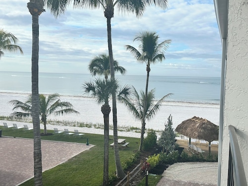 ON THE BEACH                       AT THE SOFT WHITE SAND